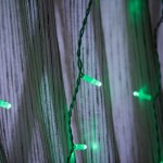 Светодиодный занавес Бахрома уличная 2 х 0.6 метра (белый провод) - Зелёная